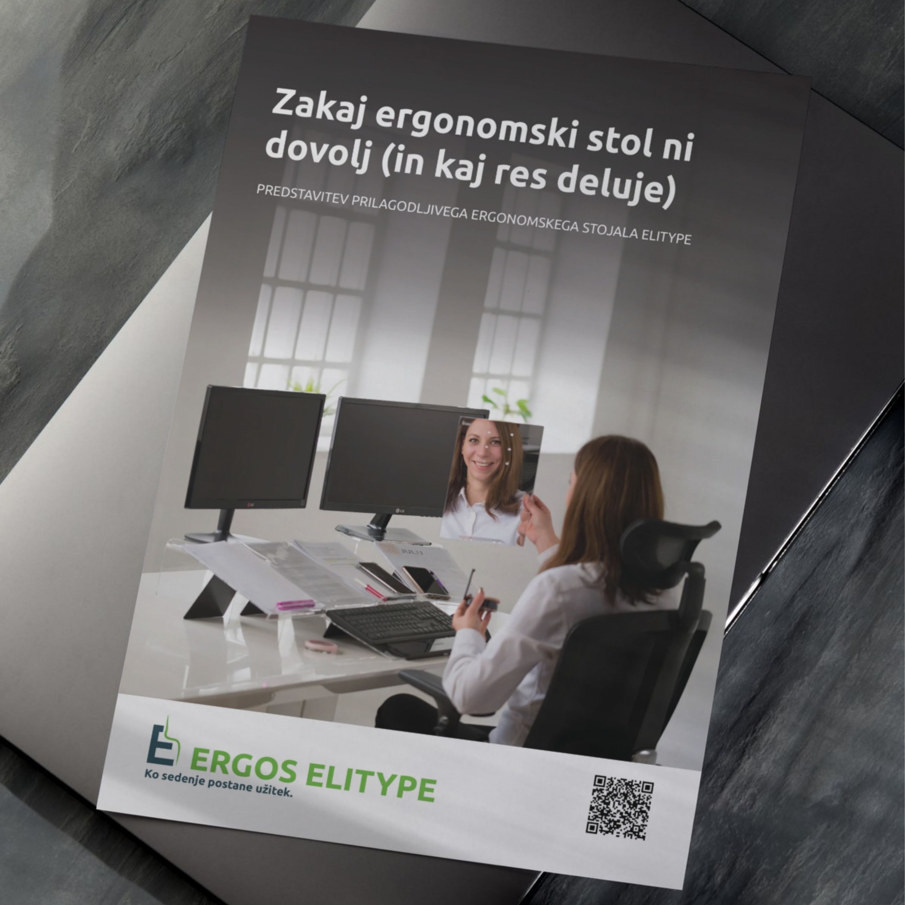 Tiskan predstavitveni katalog Elitype z naslovnico in fotografijo ergonomskega delovnega okolja
